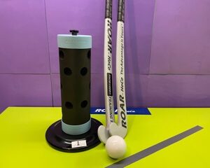 basic fhtd1000 field hockey training set, includes one device, 2 field hockey training sticks, and 1 field hockey ball